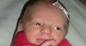 Our baby girl!  And no, she doesn't have red hair - just bad lighting.  :)